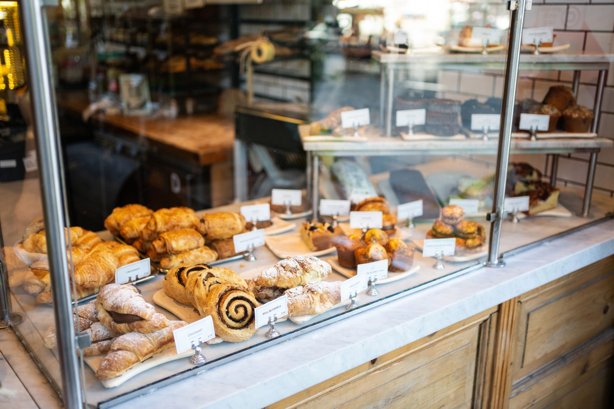 Bakery display case filled with fresh baked goods